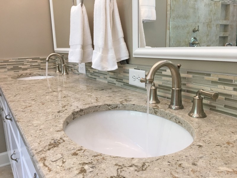 bathroom remodel sink in granite countertop